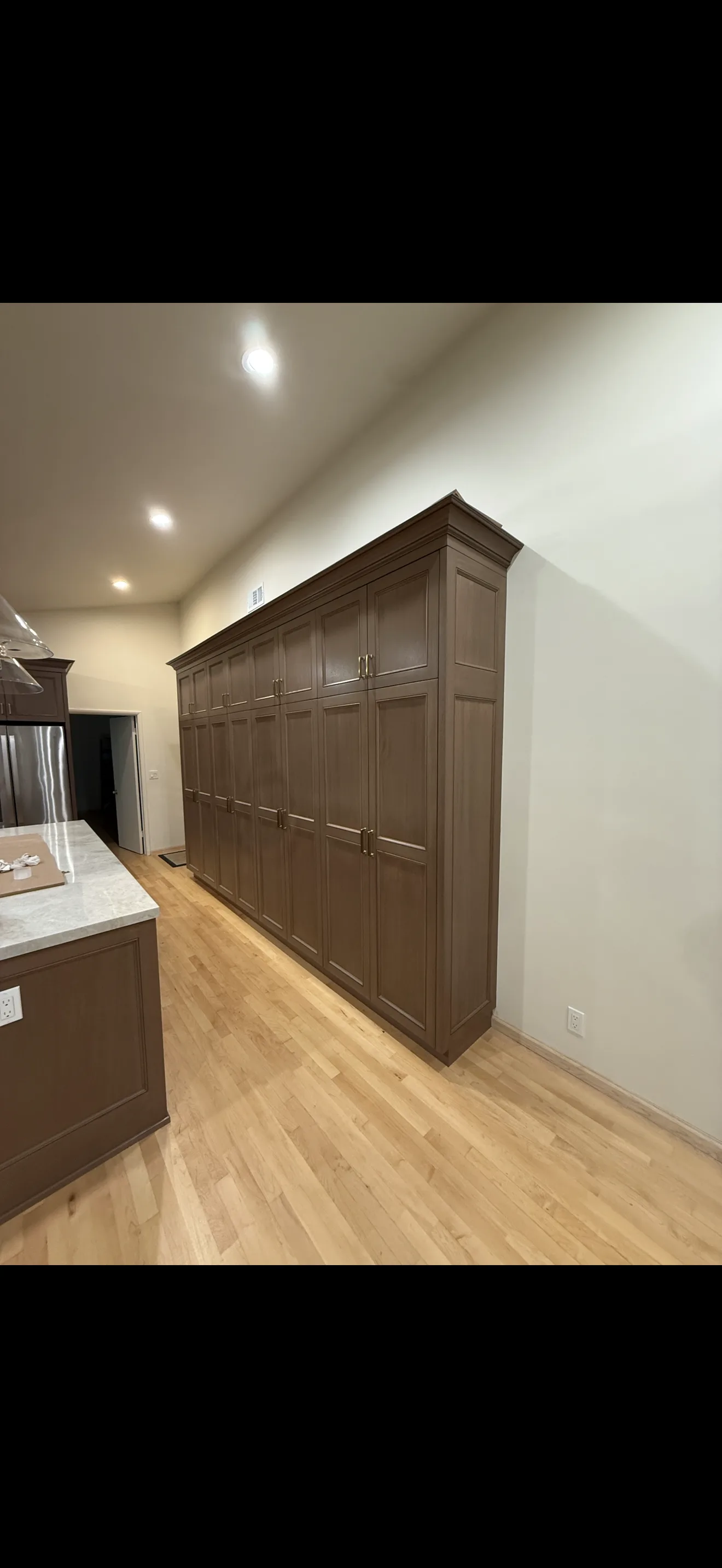 Finished stained cabinetry in a kitchen